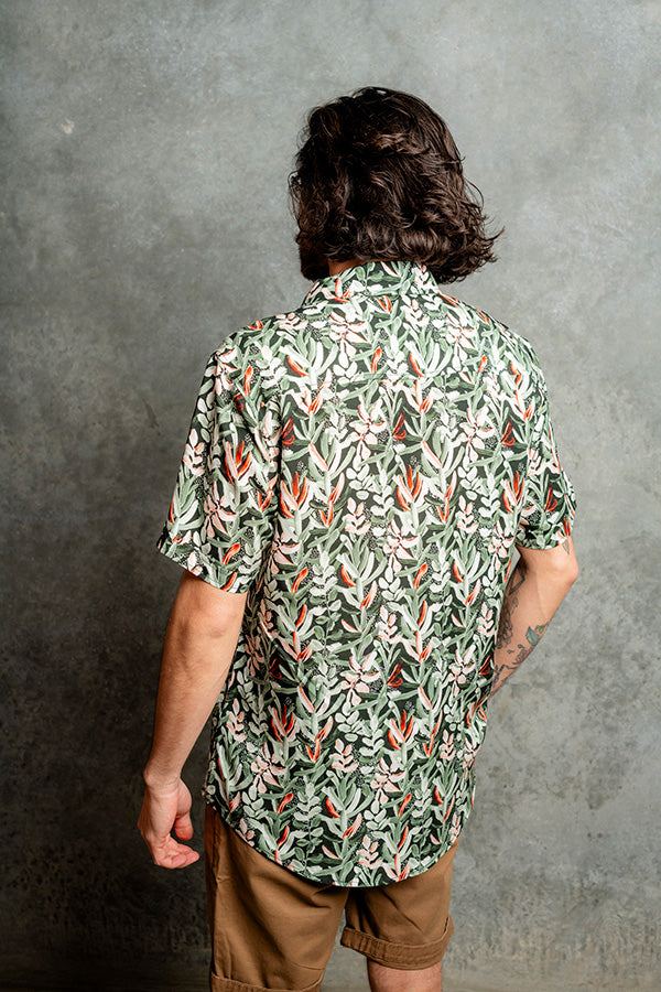 Relaxed fit shirt with Protea floral pattern in shades of green, orange, and white