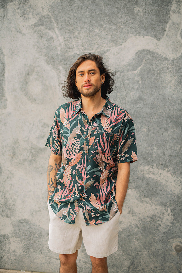 Stylish short sleeve shirt in teal with detailed botanical prints for any occasion