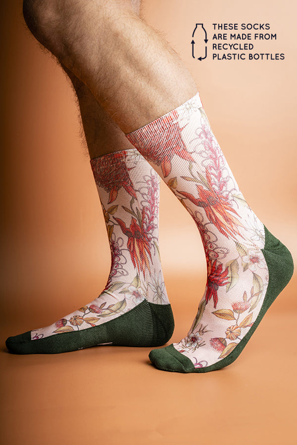 Recycled polyester socks with a colorful floral print inspired by Australian flora, combining style with environmental consciousness
