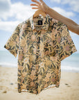 Casual summer shirt with a vibrant botanical pattern, perfect for outdoor celebrations and beach gatherings