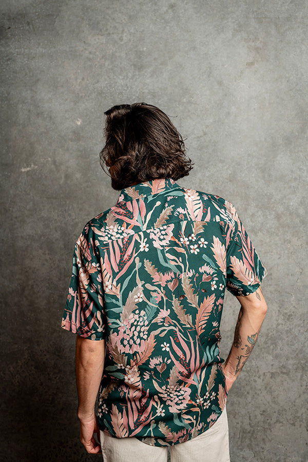 Relaxed fit teal shirt featuring Australian Wax Flower and ocean-inspired hues
