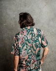 Relaxed fit teal shirt featuring Australian Wax Flower and ocean-inspired hues