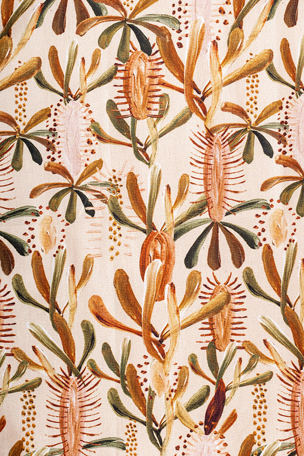 Grass Tree Nude print depicts resilient Australian grass trees in warm tones of mocha, burnt orange, sage green, and terracotta on a soft nude background