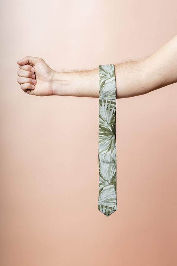 Elegant sage green cotton tie featuring a fan palm design inspired by the Australian Licuala ramsayi palm, ideal for stylish, nature-inspired attire