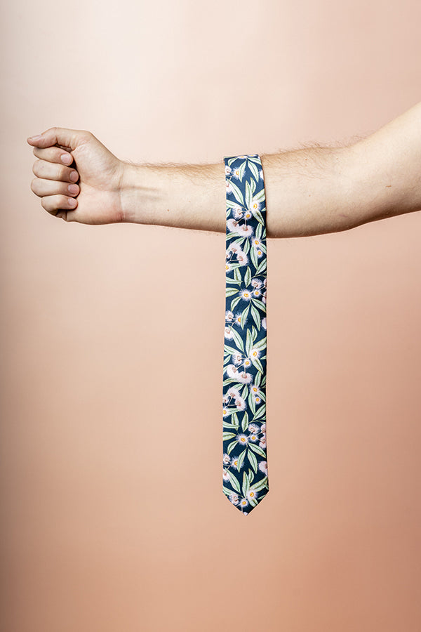 Stylish steel blue tie crafted from cotton, adorned with Australian native gum tree flowers, perfect for weddings and special events