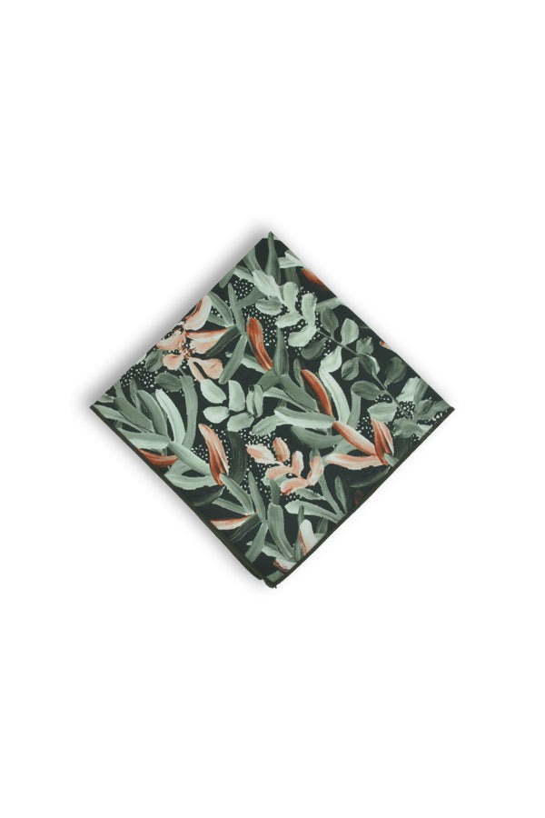Elegant pocket square featuring a forest green base with painted white protea flora, ideal for adding a touch of nature to formal attire
