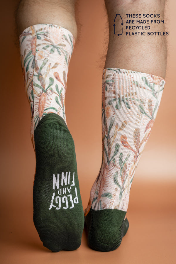 Eco-friendly socks in a nude shade, featuring a subtle Grass Tree pattern, inspired by the resilience of Australian flora after bushfires